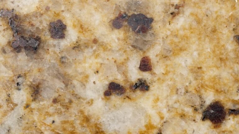 Engineered quartz kitchen countertop, showing the uniform speckled pattern of ground stone in resin